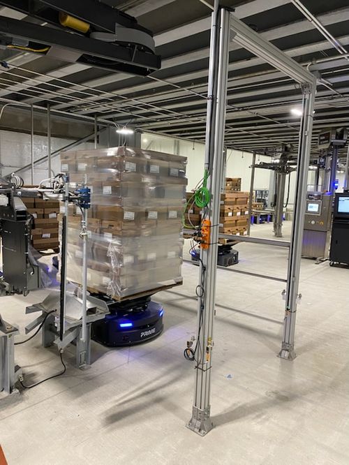 Prime Profile Station — MobilePallet AMR passing through profiler frame for pallet integrity check before next workflow step