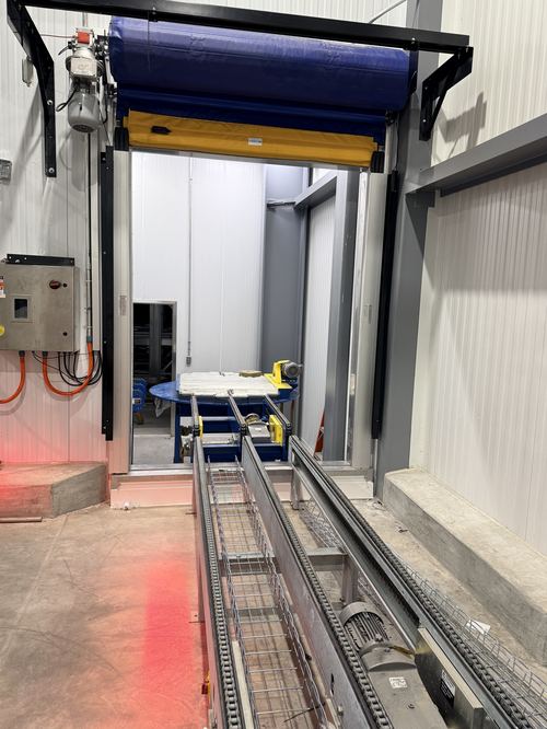 Pallet conveyor and turntable system integrated with PES